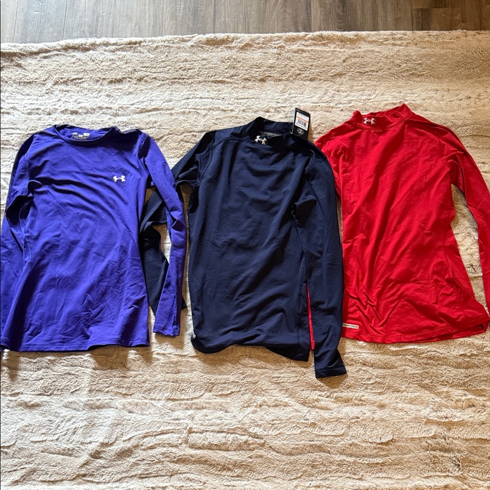 Under Armour Trio: Purple, Black, and Red Long Sleeve Shirts